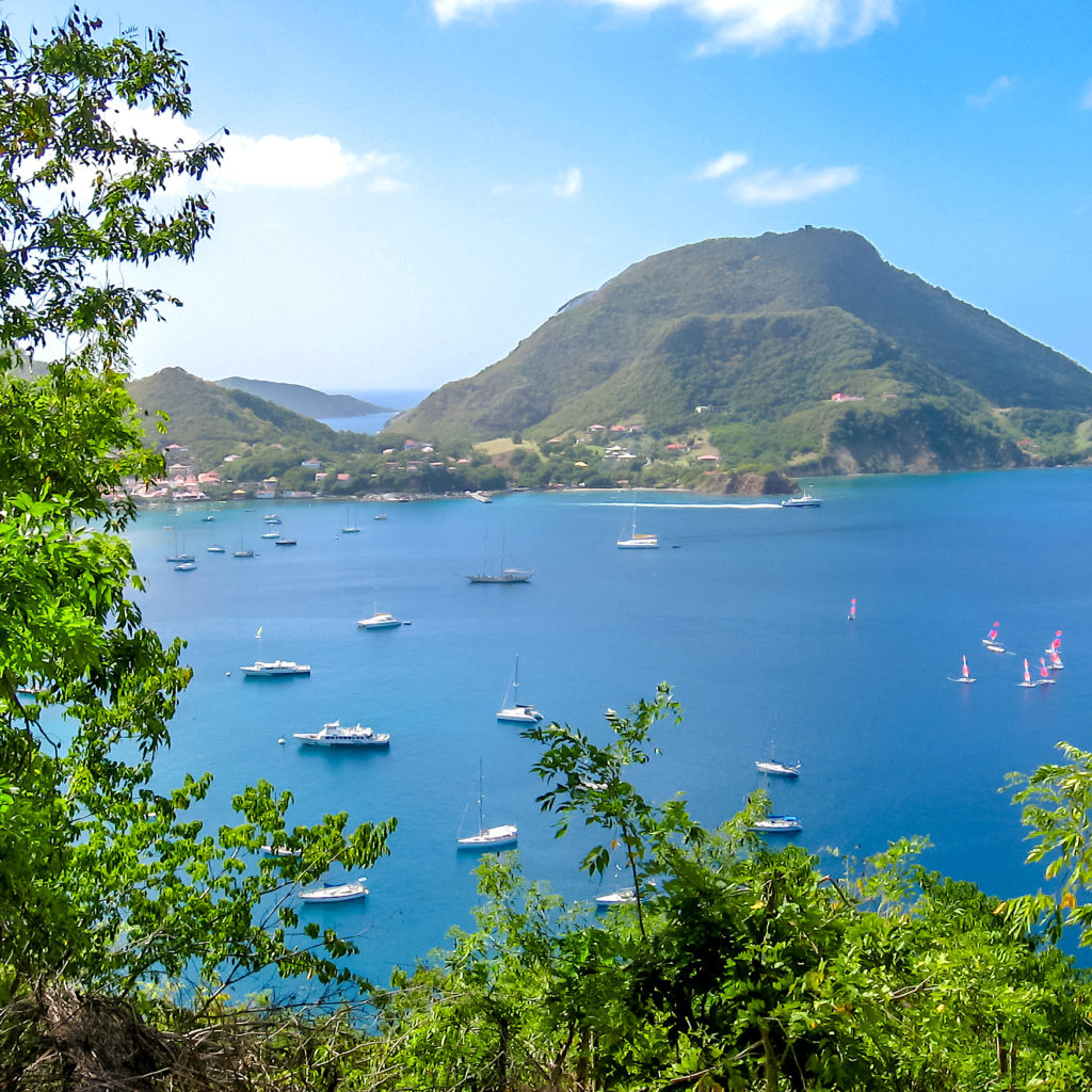 Spectacular overlook of bay of Anse du Bourg in Terre-de-Haut, considered the third bay in the world for beauty. Archipelago of Les Saintes, 15 kilometers from Guadeloupe, Antilles, Caribbean.