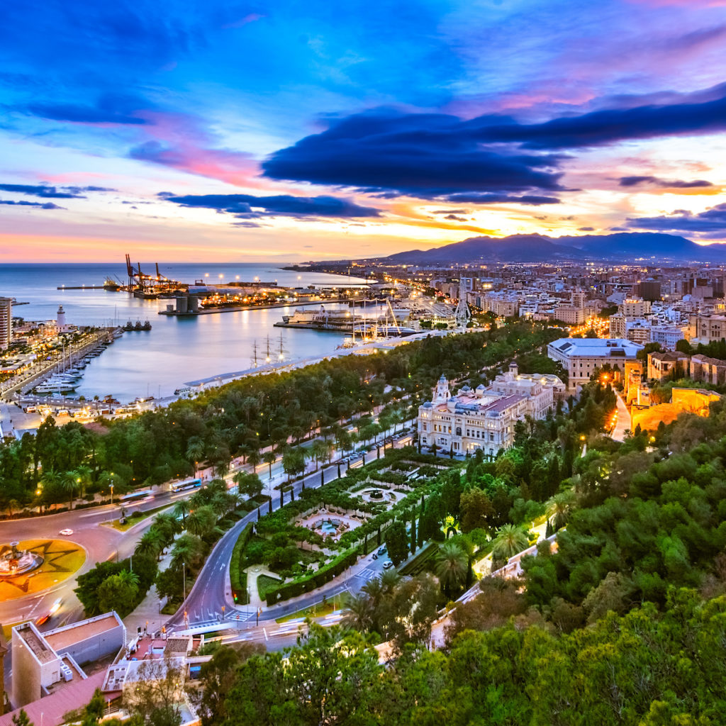 Scenic view of Malaga, southern Spain, at dusk, showing the port and its surroundings