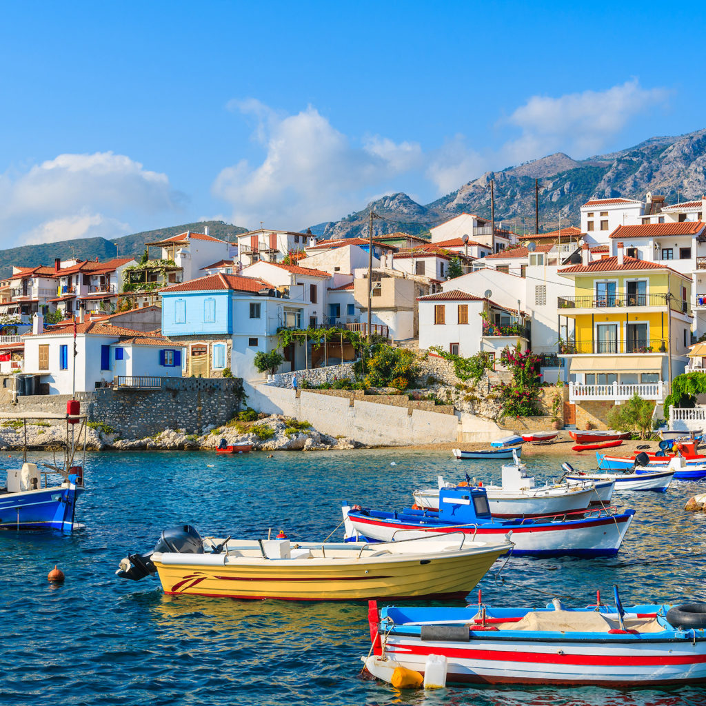 Colorful fishing boats in Kokkari port, Samos island, Greece